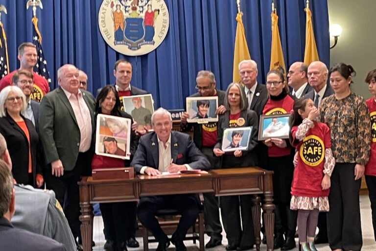 Phil Murphy signing legislation