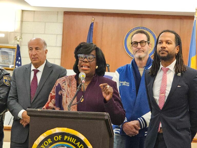 Mayor Cherelle Parker speaks behind a podium