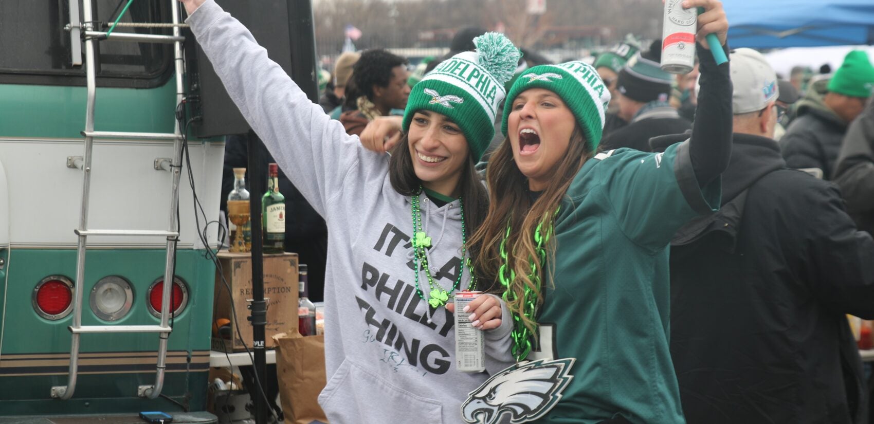 two Eagles fans cheer