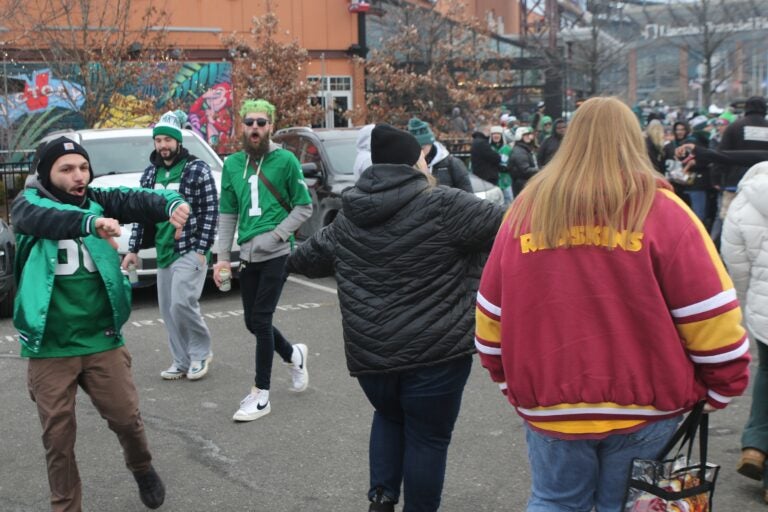 Eagles fans boo two Commanders fans