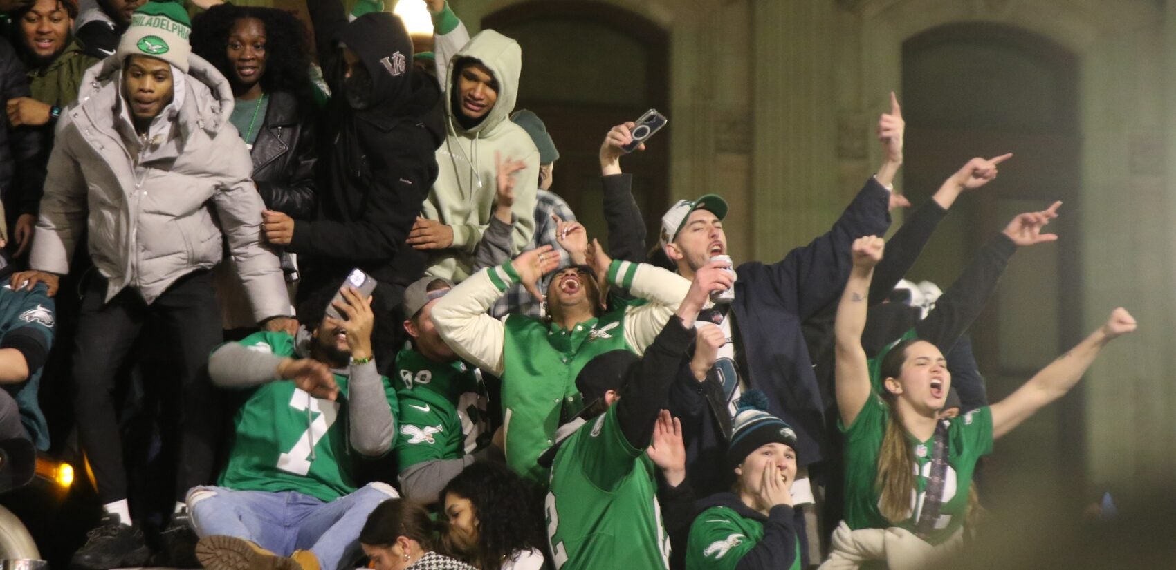 many fans on a trash truck