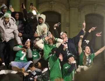 many fans on a trash truck