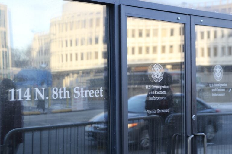 doors to the ICE office at 114 North 8th Street