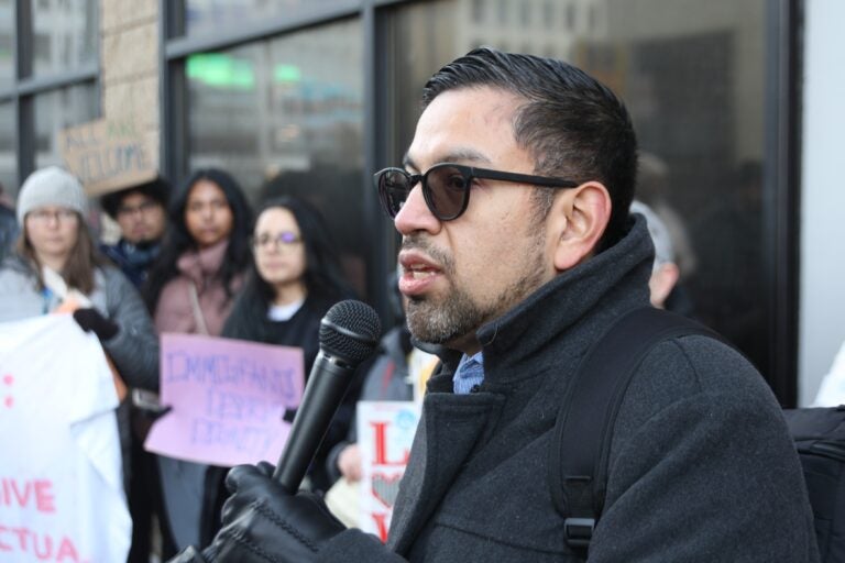 Julio Rodriguez speaks into a microphone