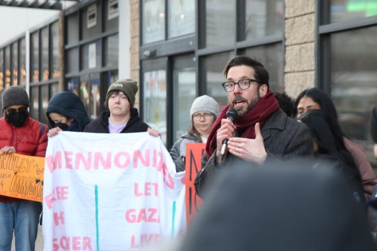 Peter Pedemonti speaks into a microphone