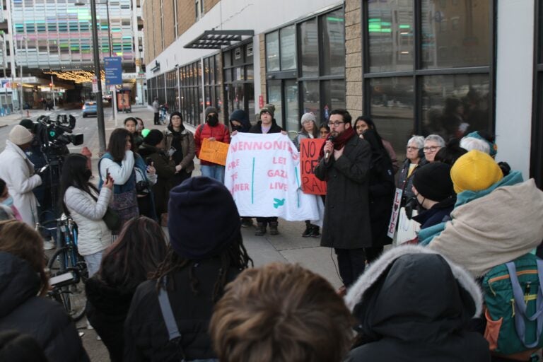 Peter Pedemonti speaks to protesters