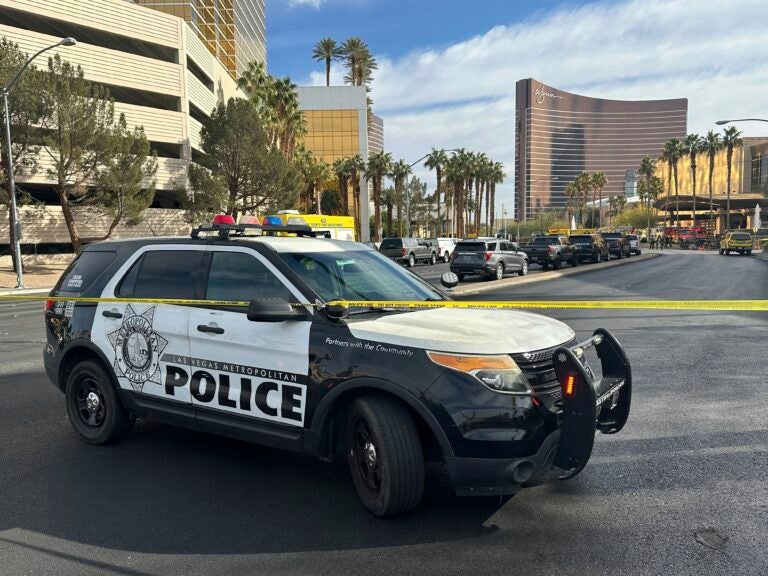 Police block the area after a vehicle caught fire and exploded outside the lobby of President-elect Donald Trump's hotel Wednesday, Jan. 1, 2025.