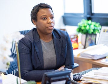 Ayanna Greene-Davis sitting at her desk