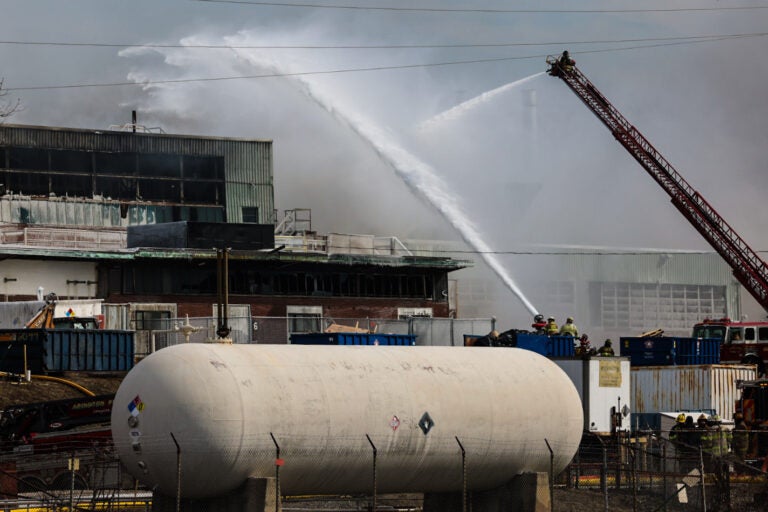 fire crews battling the fire at the warehouse