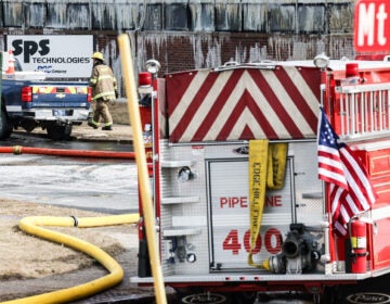 fire crews battling the fire at the warehouse