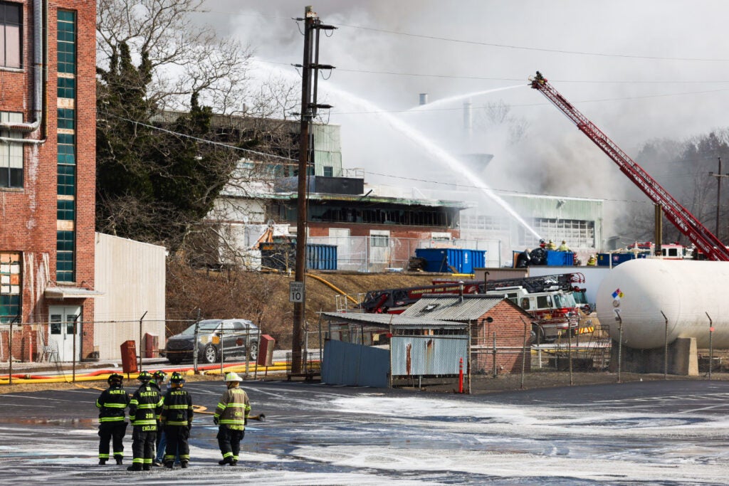 fire crews battling the fire at the warehouse