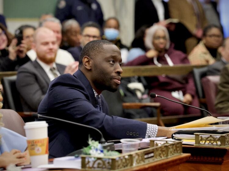 2025 01 23-e lee-isaiah thomas-philadelphia city hall council chambers profile Isaiah Thomas looks on