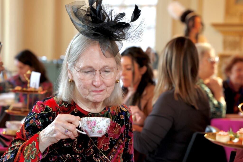 Christine Smith wearing a fascinator hat