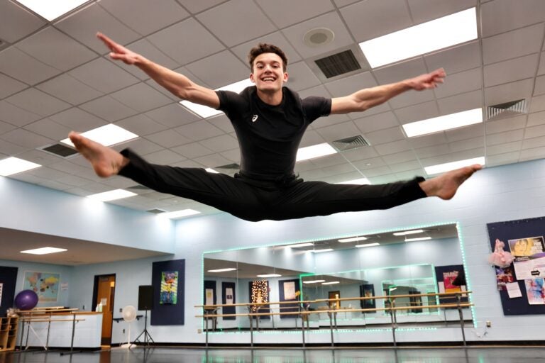 Stephen Tetkowski, a senior ballet student at the Arts Academy of Benjamin Rush, is also a kicker for the George Washington High School football team. He says his dance training has prepared him well for sports. (Emma Lee/WHYY)