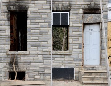 the gutted home and front door of 753 Walnut St.