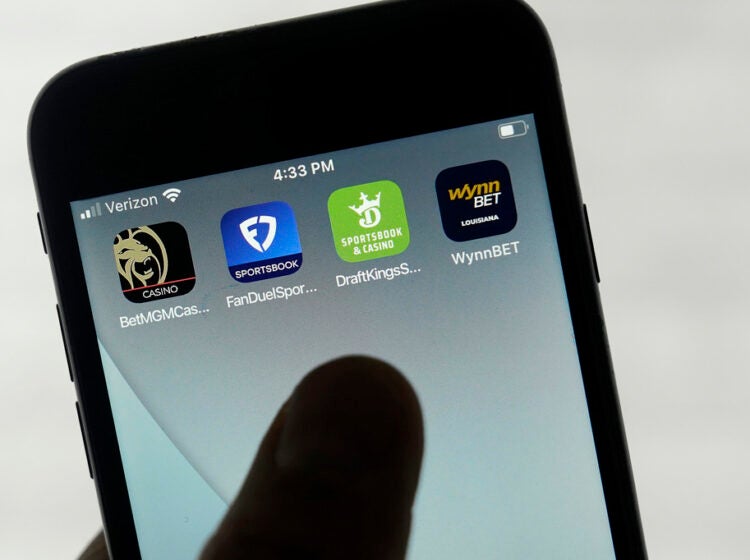 FILE - FanDuel, DraftKings and other online gambling apps are displayed on a phone in San Francisco, Sept. 26, 2022.   (AP Photo/Jeff Chiu, File)