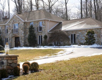 The Chester Heights, Pennsylvania home of a couple murdered in 2022 with snow on the lawn