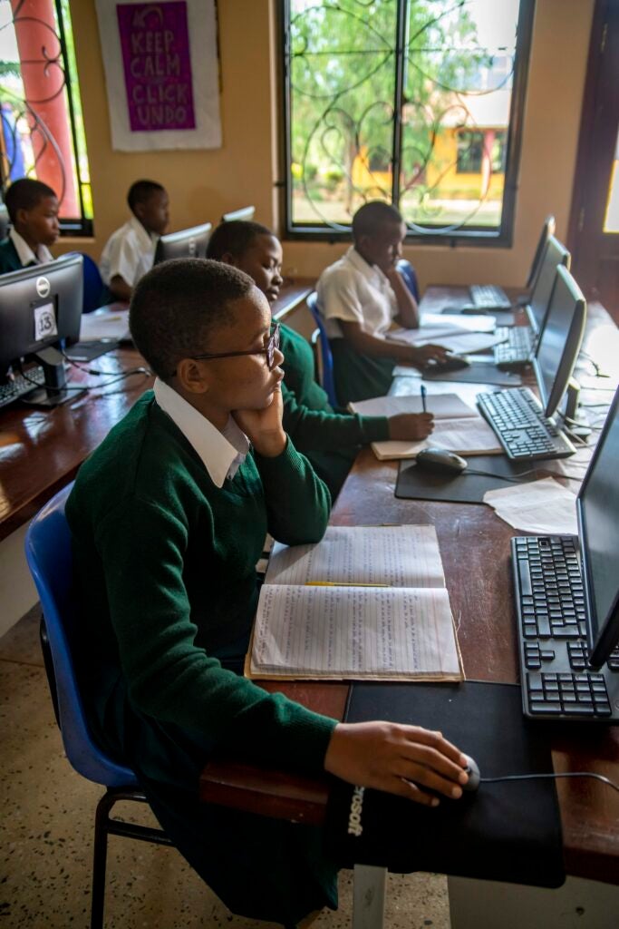 Students working on computers in a classroom