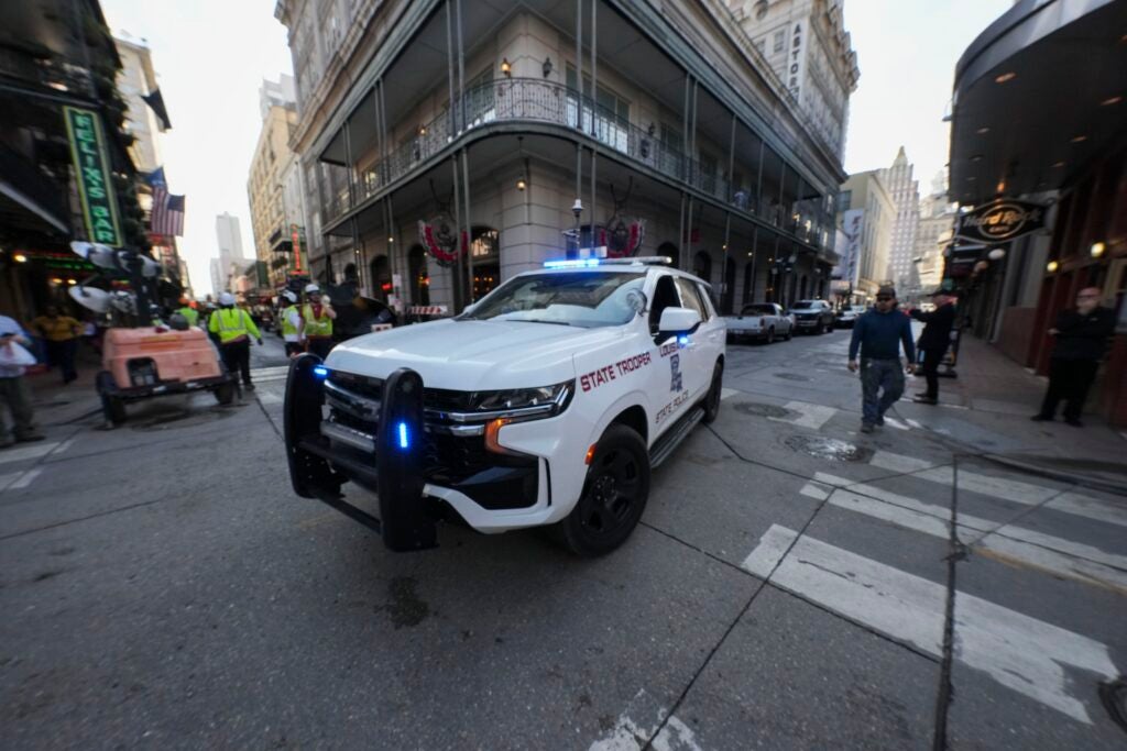 A police car blocking an intersection