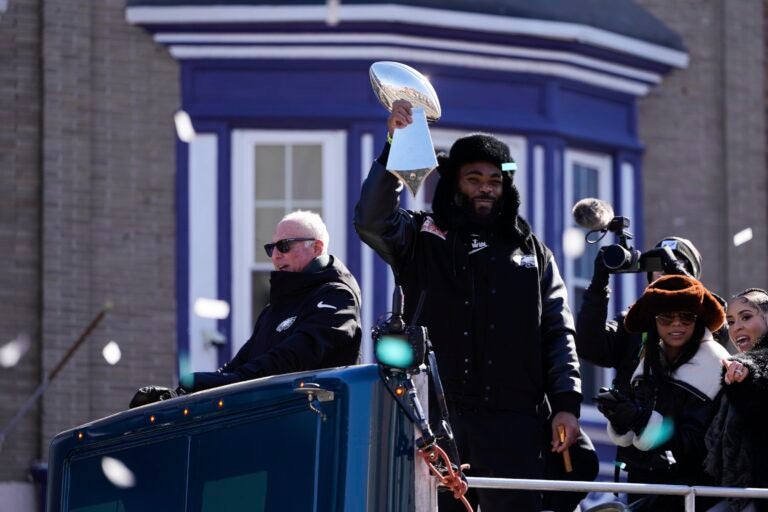 Brandon Graham holds up the trophy