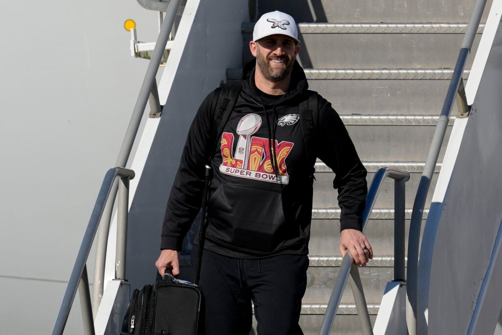 Nick Sirianni walking off an airplane