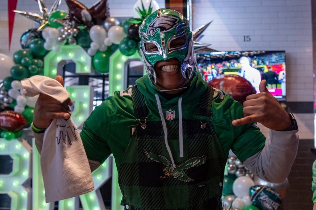 An Eagles fan wearing a mask