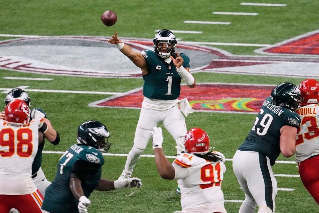 Jalen Hurts throwing the ball during the game