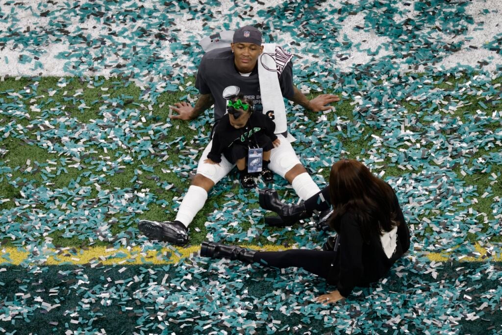 DeVonta Smith on the field after winning the Super Bowl