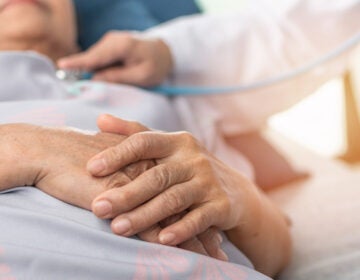 An elderly patient lying on hospital bed. (Bigstock/Rido81)