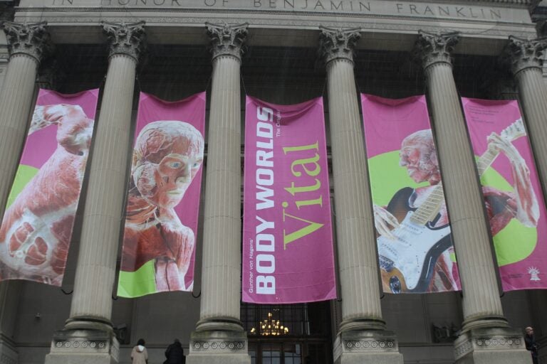 the sign for the exhibit hanging from the Franklin Institute