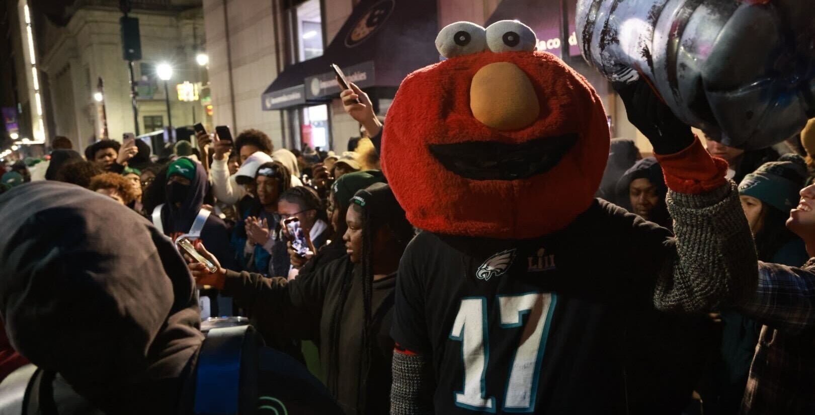 Elmo celebreating with Eagles fans