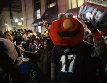 Elmo celebreating with Eagles fans