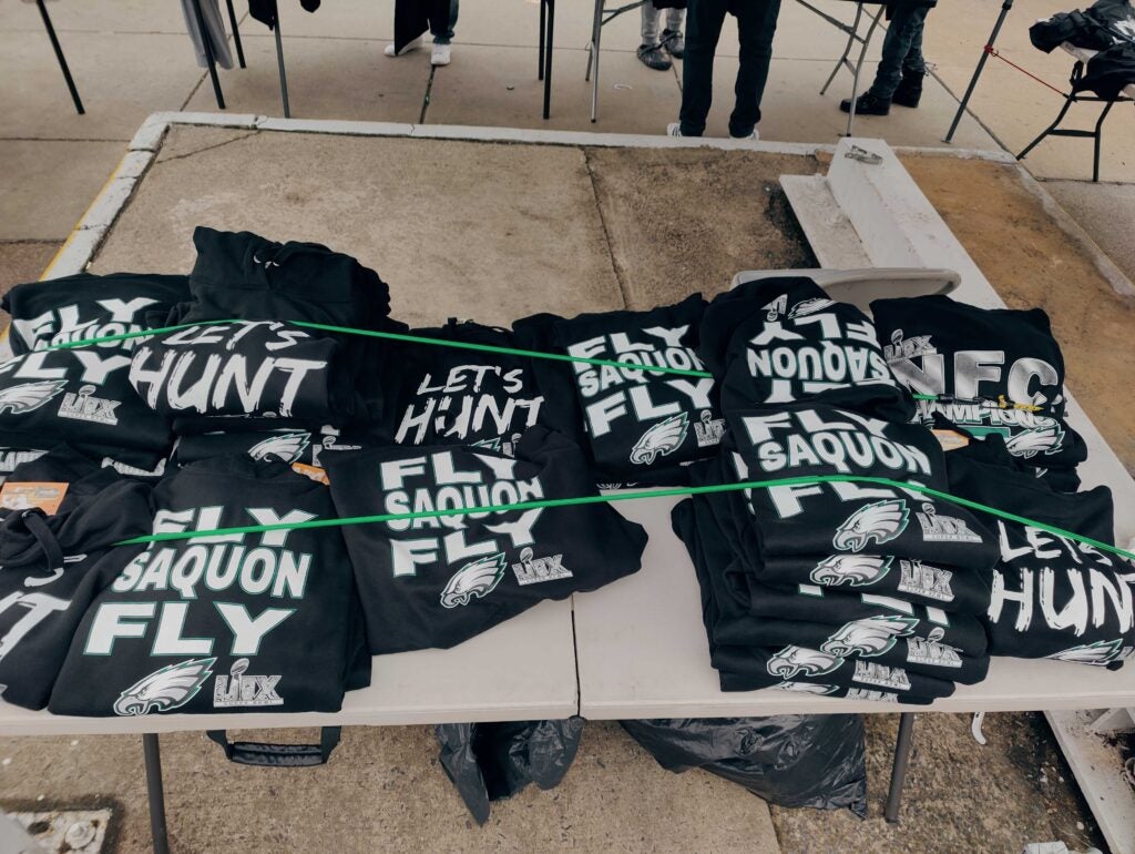 A pop-up T-shirt vendor does brisk businesses at Aramingo Avenue and York Street in Fishtown. 