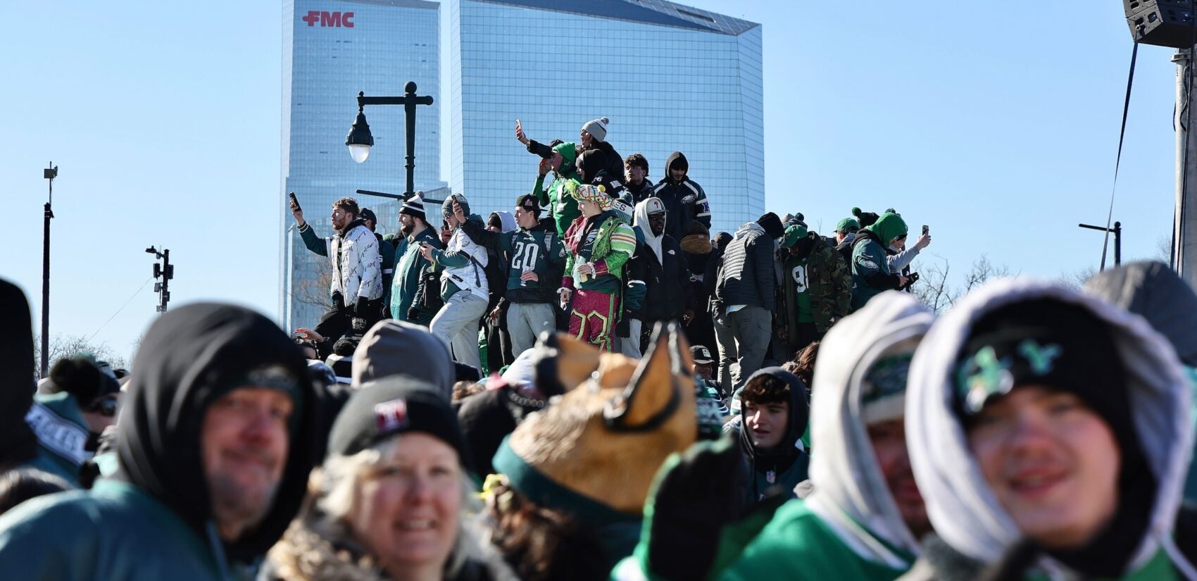 Fans pack along the Parkway awaiting the Eagles parade