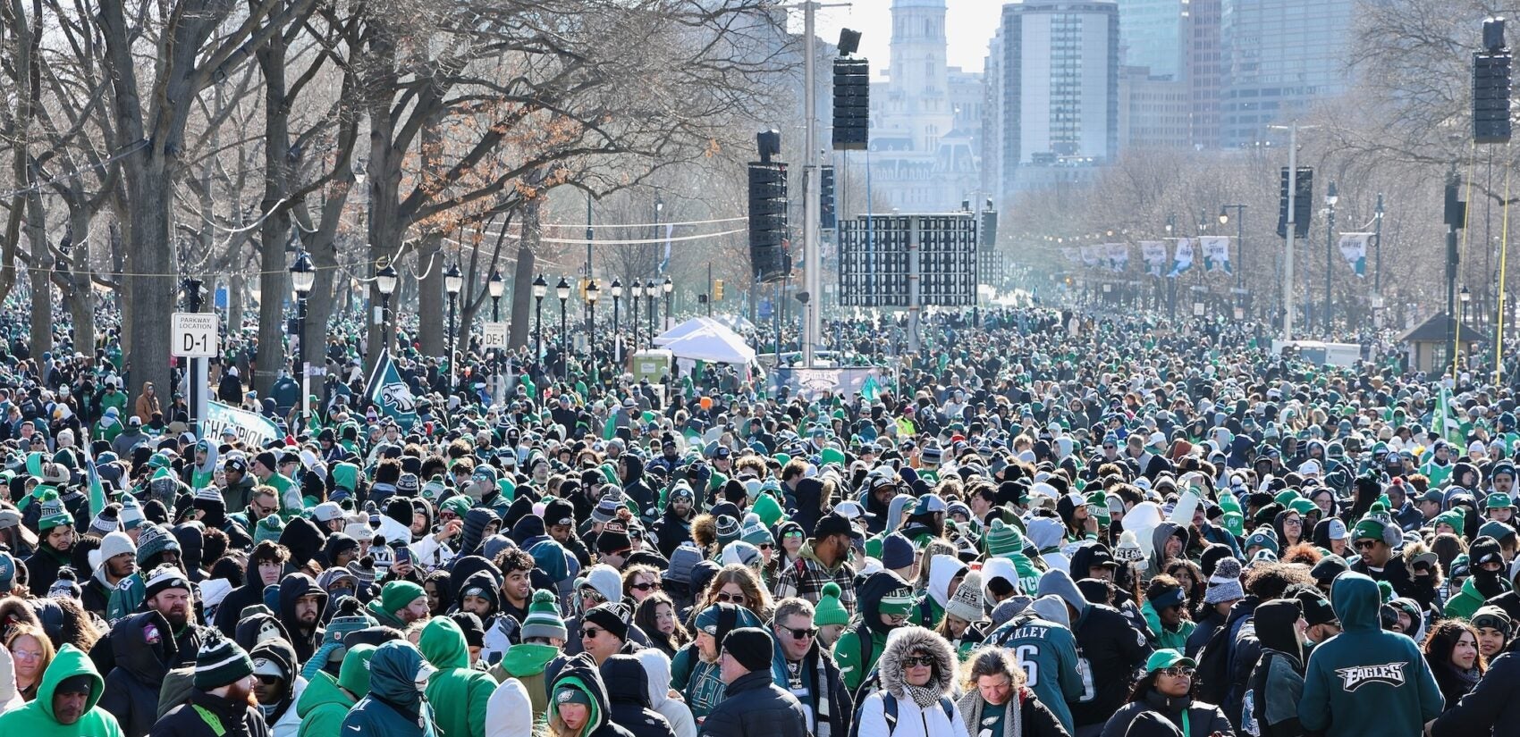 Fans pack along the Parkway awaiting the Eagles parade