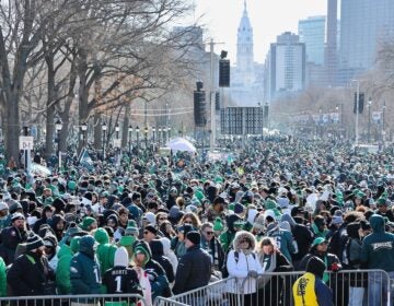 Fans pack along the Parkway awaiting the Eagles parade