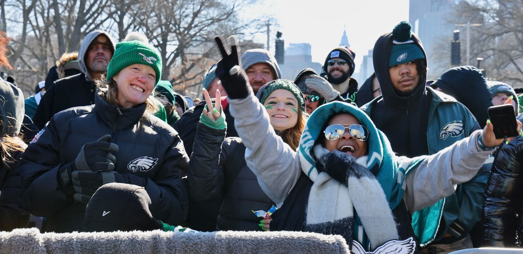 Fans pack along the Parkway awaiting the Eagles parade