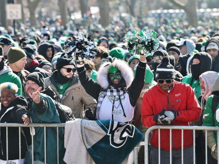 Eagles fans waiting in the crowd for the parade to come to the Art Museum