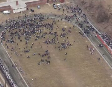 Students at Central High School on football field