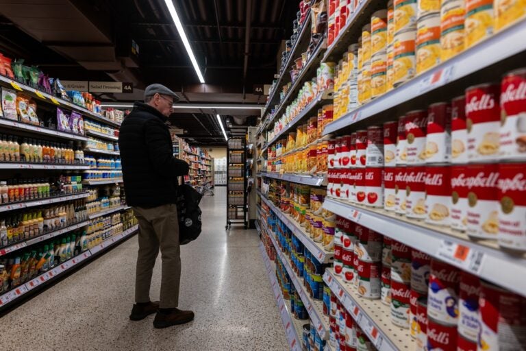 Canned soup and vegetables at NYC grocery store