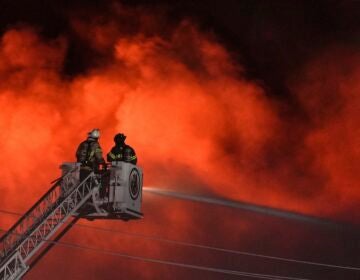 Firefighters battle a blaze at SPS Technologies in Jenkintown, Pa., Monday, Feb. 17, 2025.