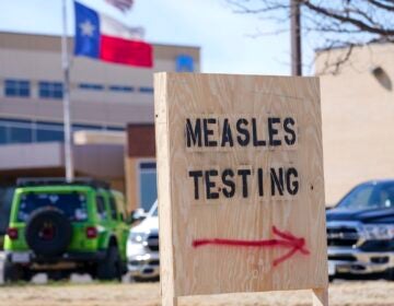 Sign offering measles testing