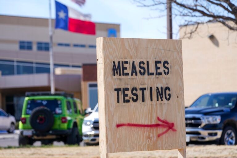 Sign offering measles testing