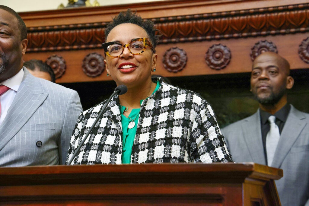 Angela D. Brooks speaking at a podium