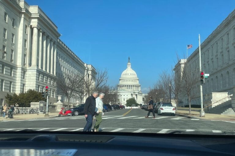 the Capitol seen from a car driving