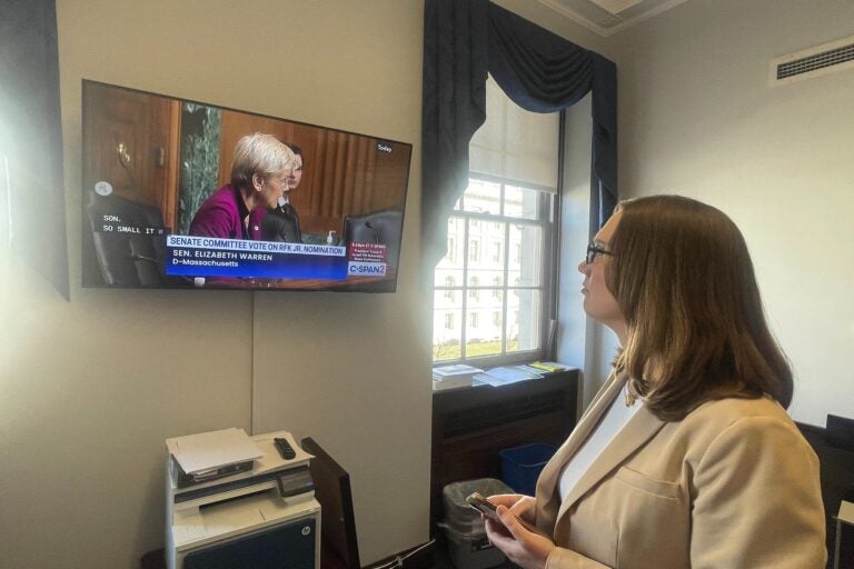 McBride watching Elizabeth Warren on TV