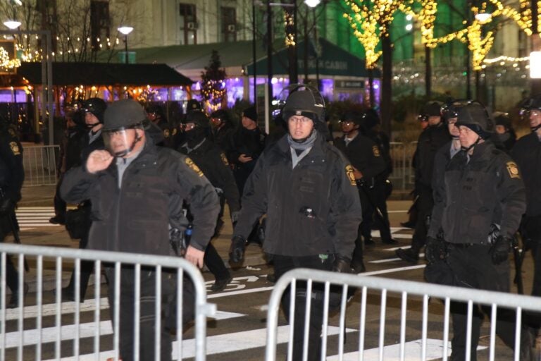 Police officers getting ready for the large crowds on the street