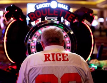 A man gambles in a casino ahead of last year's Super Bowl, on Feb. 8, 2024, in Las Vegas.