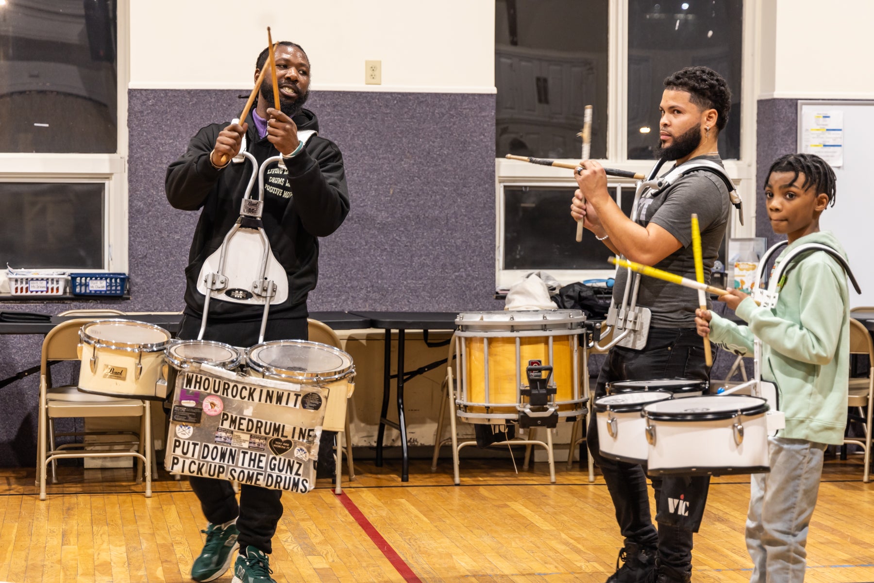 Tony Royster and two others drumming