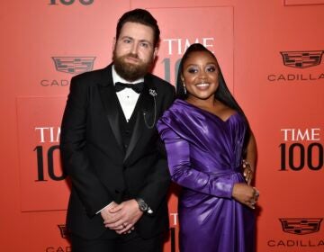 Quinta Brunson and Kevin Jay Anik pose for a photo on the red carpet at a gala event